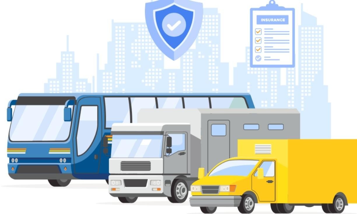 Image of a fleet of commercial vehicles, including trucks and delivery vans, parked outside an office building with the logo of Insurance Company Westerville Ohio prominently displayed. The image represents reliable and comprehensive commercial vehicle insurance services provided by the company to protect businesses in the Westerville, Ohio area.